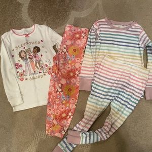 Two sets of pajamas, size 4T.  Cynthia Rowley & Honest Brand.